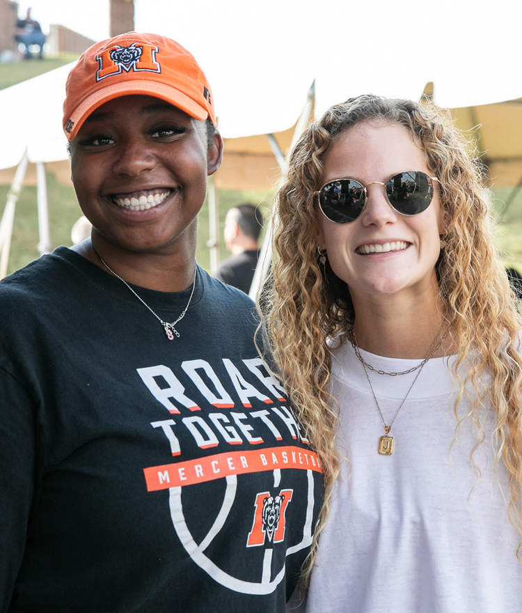 Two women posing for the camera